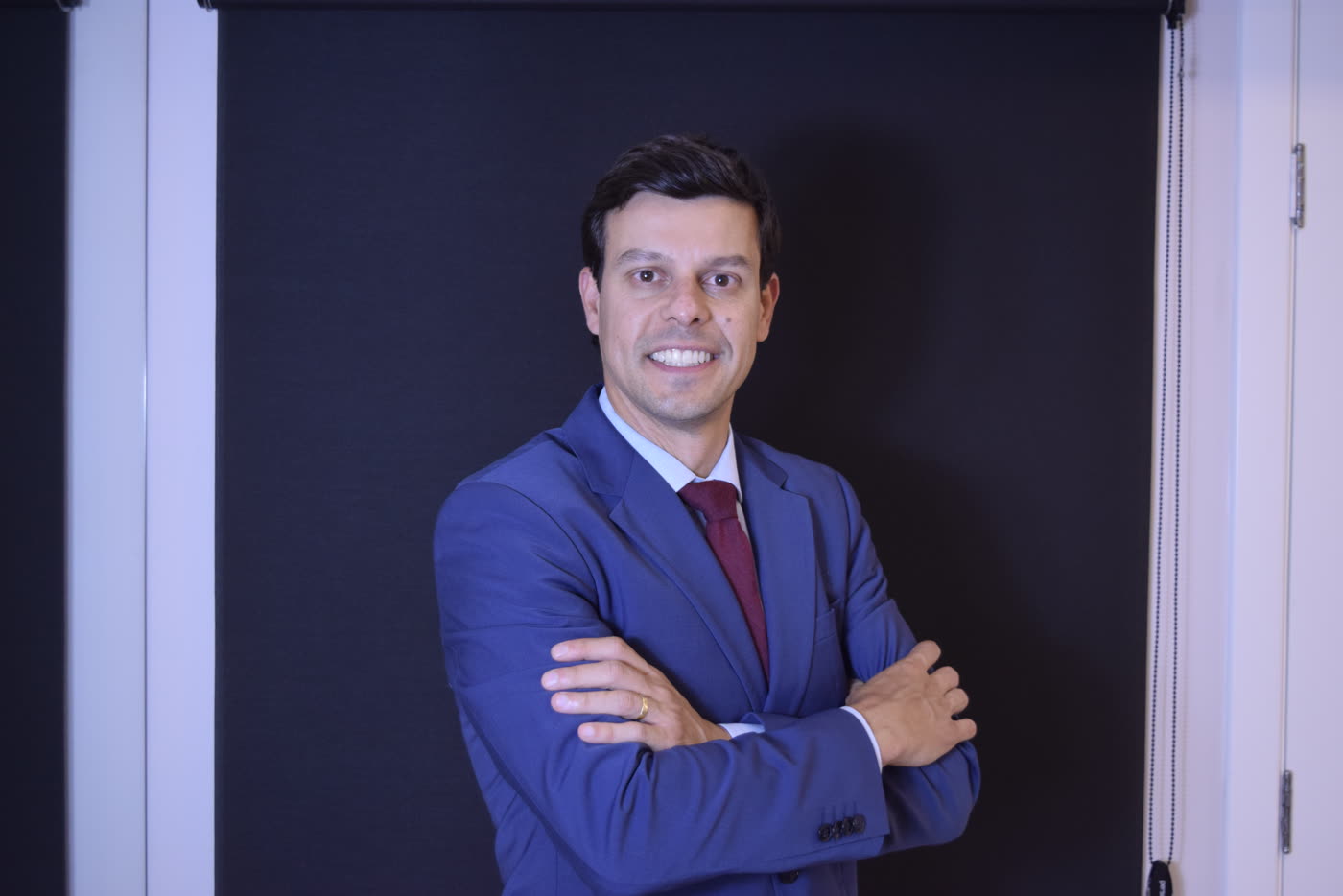 Dr. Ricardo Dolci de blazer, em retrato